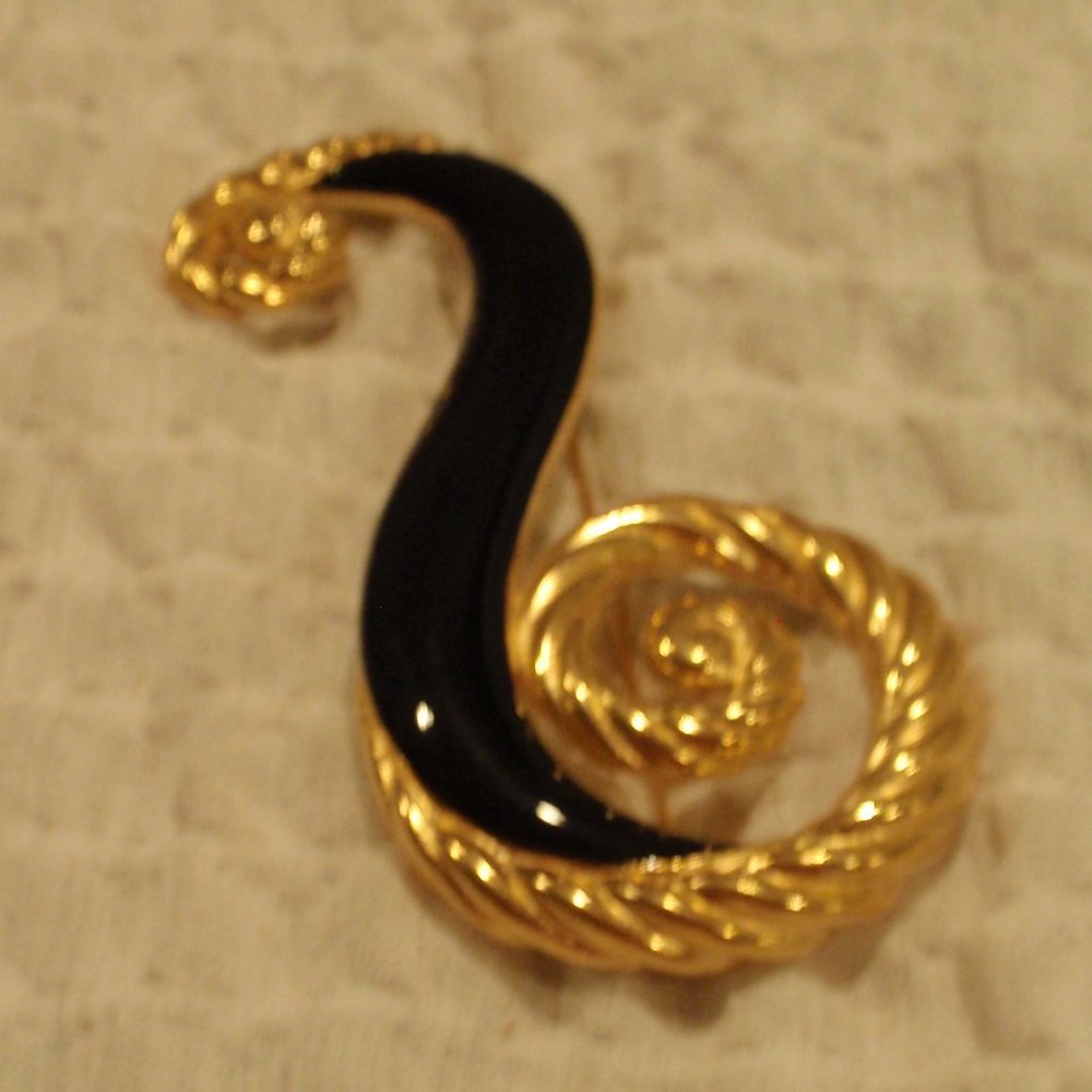Vintage Trifari Brooch Gold and black enamel.